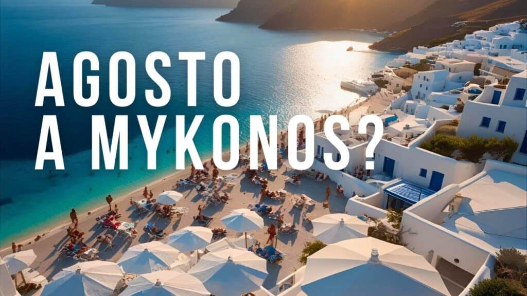 Mykonos ad Agosto: La Guida Definitiva per Vivere l'Isola al Meglio 1 Spiaggia di Mykonos ad agosto con mare cristallino e ombrelloni affollati sotto il sole greco