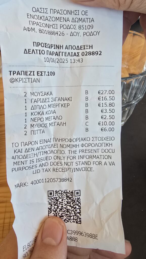 Scontrino Oasis Prasonisi (Rodi) con prezzi Moussaka (€13.50), Mythos (€5.00) e Gamberi, emesso il 06/10/2025 alle 13:43.