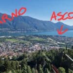 Veduta panoramica dall'alto che mostra la vicinanza di Locarno e Ascona sul Lago Maggiore, separate dal fiume Maggia.