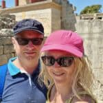 Ila and Gabriel wearing hats at Knossos Palace, Crete, during August heat.