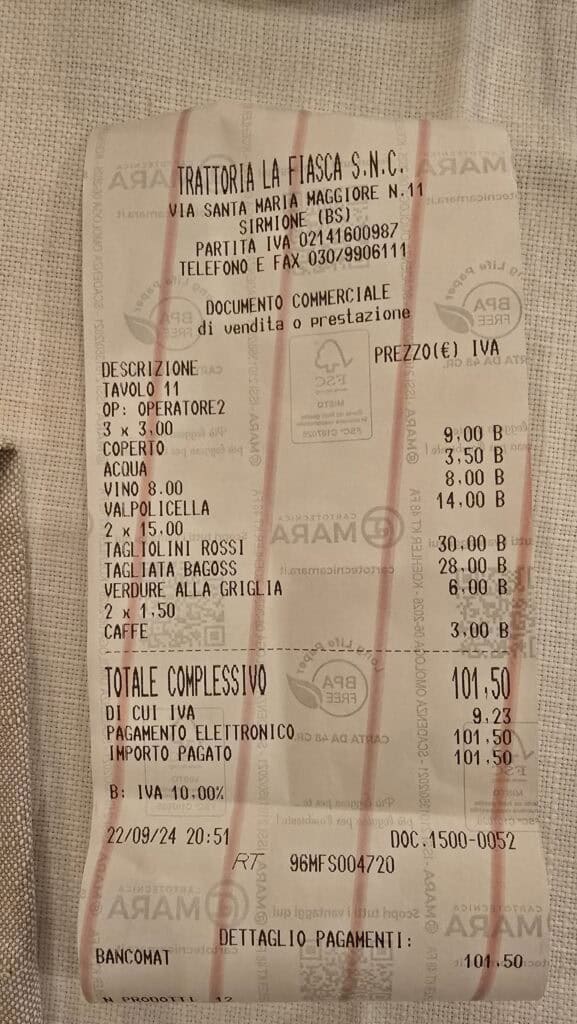 Detailed receipt from Trattoria La Fiasca in Sirmione, Lake Garda, showing the €101.50 dinner cost for three people, including prices for Tagliolini Rossi and Valpolicella wine.