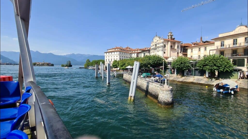 View from the boat arriving at the pier of the Beautiful Island (Isola Bella) on Lake Maggiore, Italy.