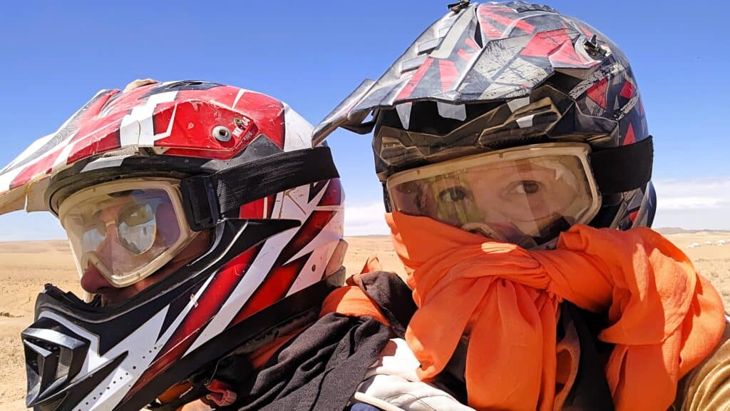 Marrakech Desert Tour: Thrilling Quad Biking & Rocky Landscapes! 1 Two people in quad biking gear, ready to explore the rocky desert near Marrakech.