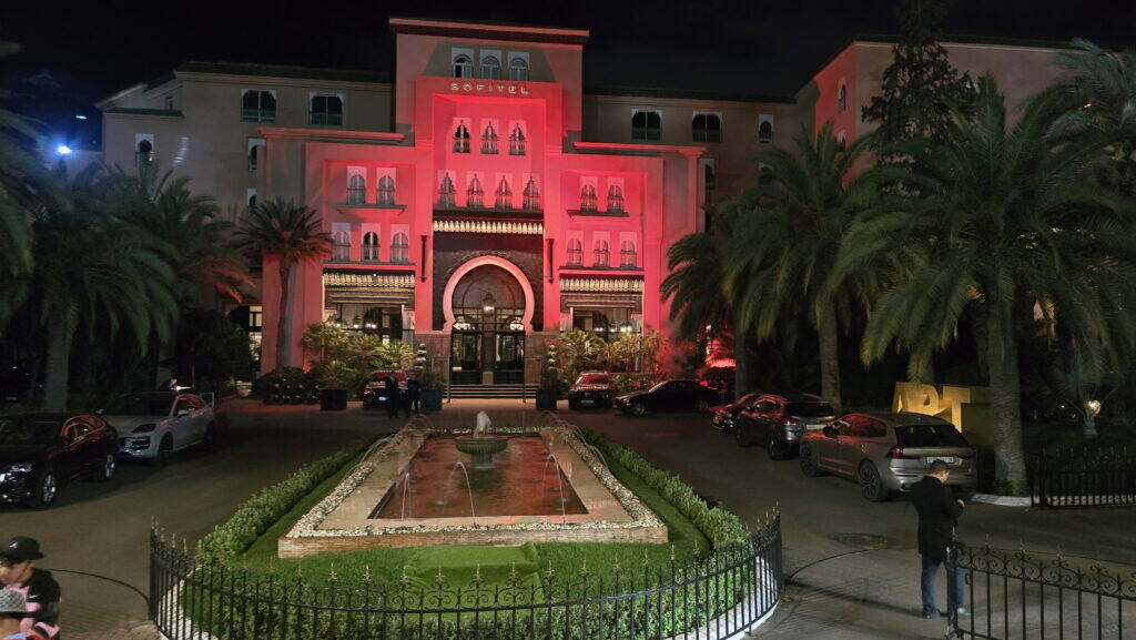 Marrakech Quad Biking: Thrills, Oasis Luxury & The City's Hidden Contrast 8 Luxury Sofitel hotel in Marrakech at night, illuminated with a fountain, showing the city's modern and opulent tourist side.