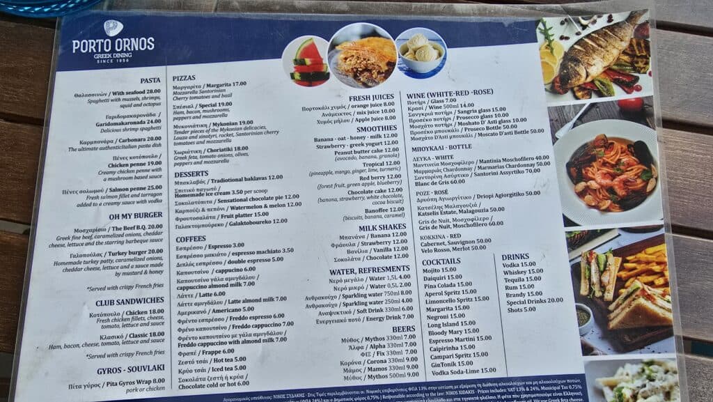Menu and prices at a beach bar restaurant in Ornos Mykonos (August 2025), showing food costs.