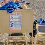 Los Cristianos beach sunbed prices 2024 example, showing beach chair and umbrella cost in Tenerife.