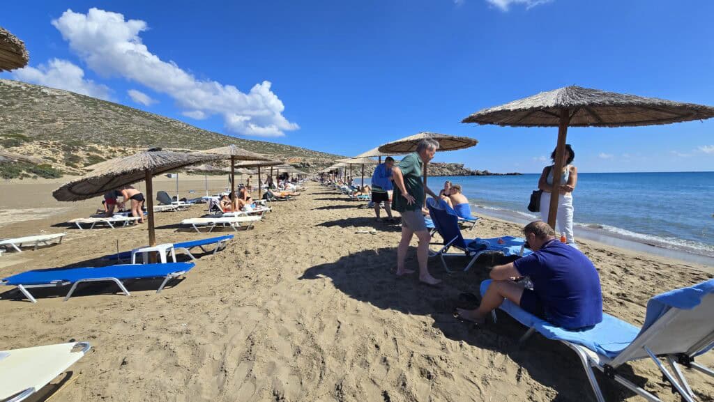 Prasonisi Rhodes: Where Two Seas Meet (2026 Planning Guide & Prices) 4 Prasonisi organized sunbed rental area on the calm Mediterranean side. Shows the size of the paid section and capacity.
