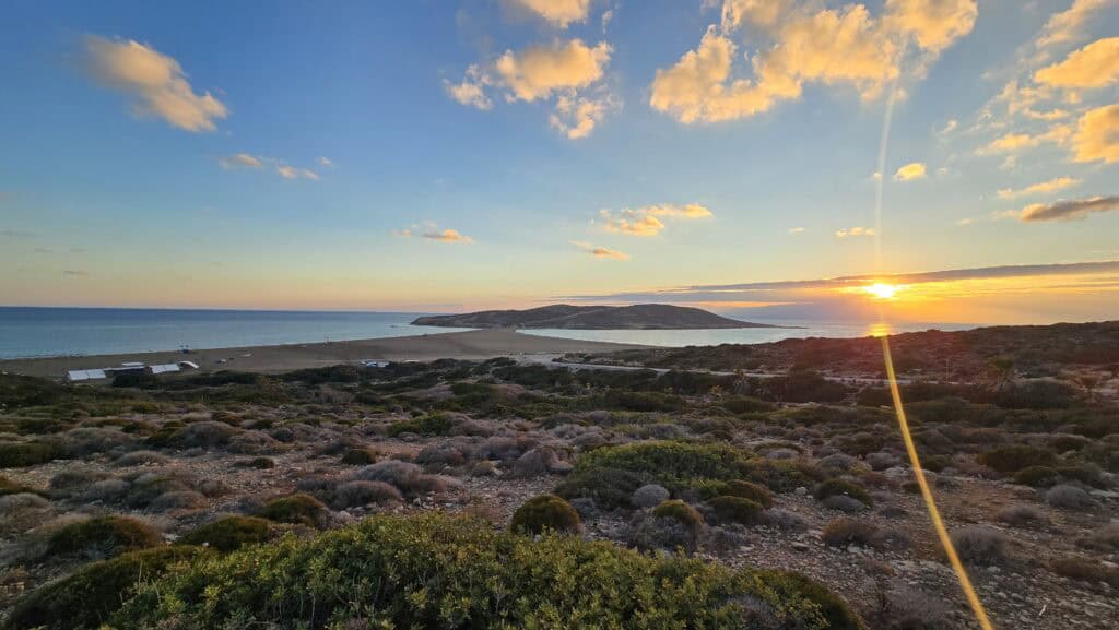Prasonisi Rhodes: Where Two Seas Meet (2026 Planning Guide & Prices) 3 Beautiful sunset view from the Prasonisi panoramic viewpoint over the two seas, marking the end of the day.