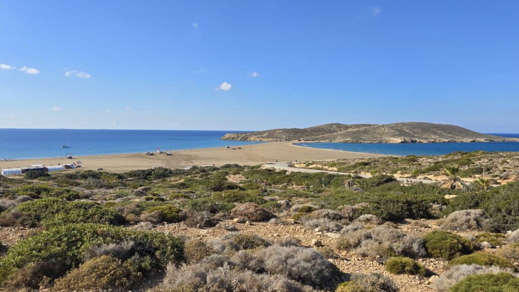 Prasonisi Rhodes: Where Two Seas Meet (2026 Planning Guide & Prices) 1 Prasonisi Rhodes overview showing the clear line where the Aegean Sea meets the calm Mediterranean. Ideal for windsurfing and kiteboarding.