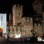 Scaliger Castle of Sirmione illuminated at night in winter on Lake Garda