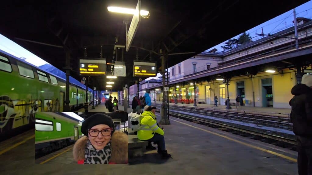 Author Ila from Tripilare at Domodossola station at dawn, ready to board the Green Train of the Alps for her winter journey in 2025 (29 Decembre 2025)