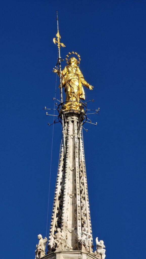 Things to do in Milan Terraces of the Cathedral on the Milano Duomo rooftops higher point with the Madonna above it 2