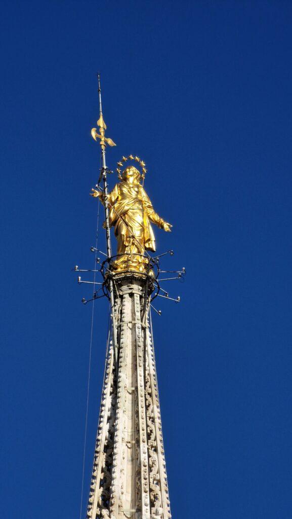 Things to do in Milan Terraces of the Cathedral on the Milano Duomo rooftops higher point with the Madonna above it 6